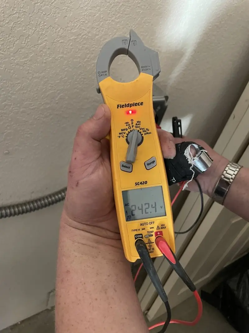 Voltage testing with clamp meter during Generator Installation in Indian River Shores